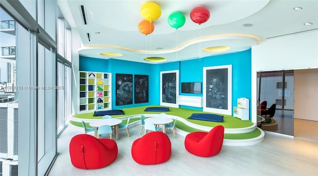 851 NE 1st Ave Unit Ph4912, Miami, FL 33132 - recreation room featuring wood finished floors and recessed lighting