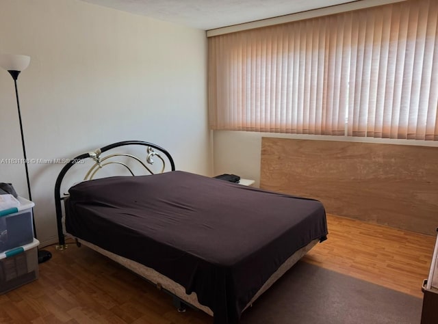 11685 Canal Dr Unit 303, North Miami, FL 33181 - bedroom with wood finished floors