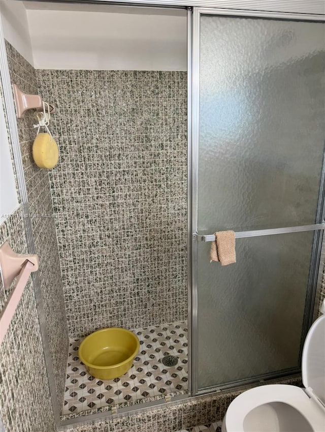 11685 Canal Dr Unit 303, North Miami, FL 33181 - full bath with a shower stall and toilet