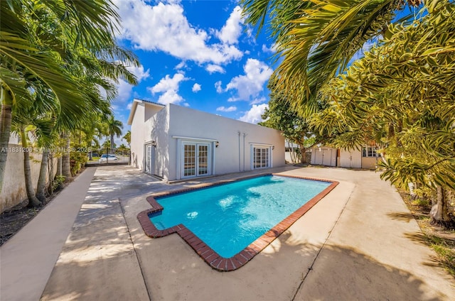 15235 SW 99th Ct, Miami, FL 33157 - view of pool featuring french doors and a patio