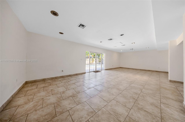15235 SW 99th Ct, Miami, FL 33157 - spare room with light tile patterned floors, recessed lighting, and french doors