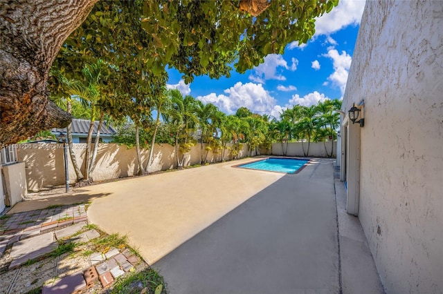 15235 SW 99th Ct, Miami, FL 33157 - view of pool with a patio area and a fenced backyard