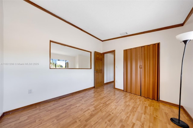15235 SW 99th Ct, Miami, FL 33157 - unfurnished bedroom with light wood-type flooring, ornamental molding, and a closet