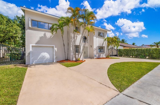 15235 SW 99th Ct, Miami, FL 33157 - mediterranean / spanish home featuring stucco siding, driveway, and an attached garage
