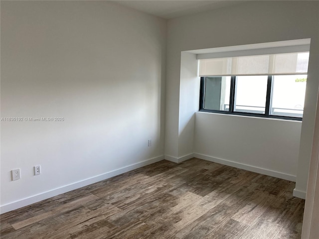 650 NE 32nd St Unit 802, Miami, FL 33137 - spare room with dark wood finished floors
