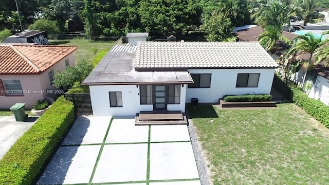 771 E 35th St, Hialeah, FL 33013 - back of house featuring stucco siding
