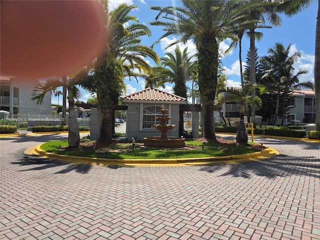 4720 NW 114th Ave Unit 206, Doral, FL 33178 - view of front of house featuring stucco siding and a tiled roof