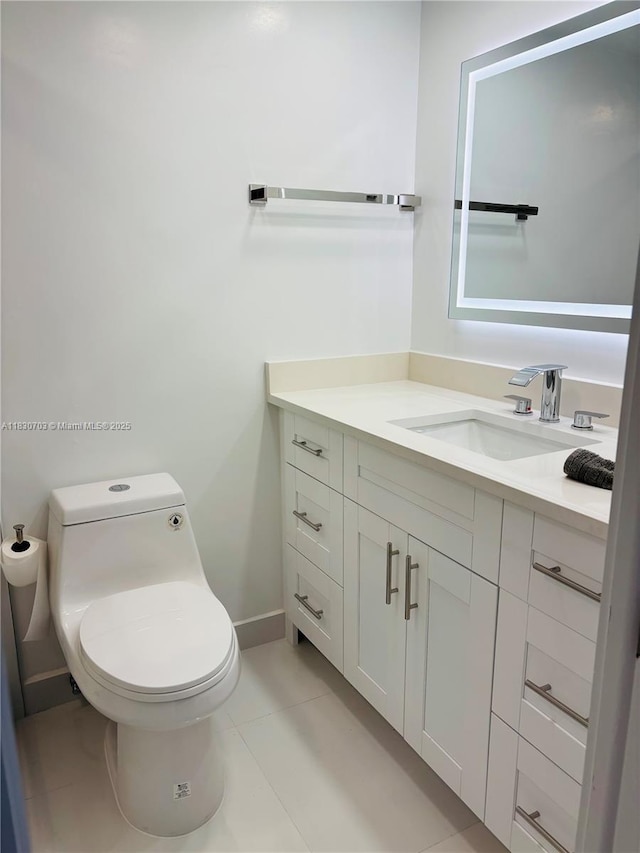 4025 Ellesmere B 4025, Deerfield Beach, FL 33442 - half bathroom featuring vanity and tile patterned flooring