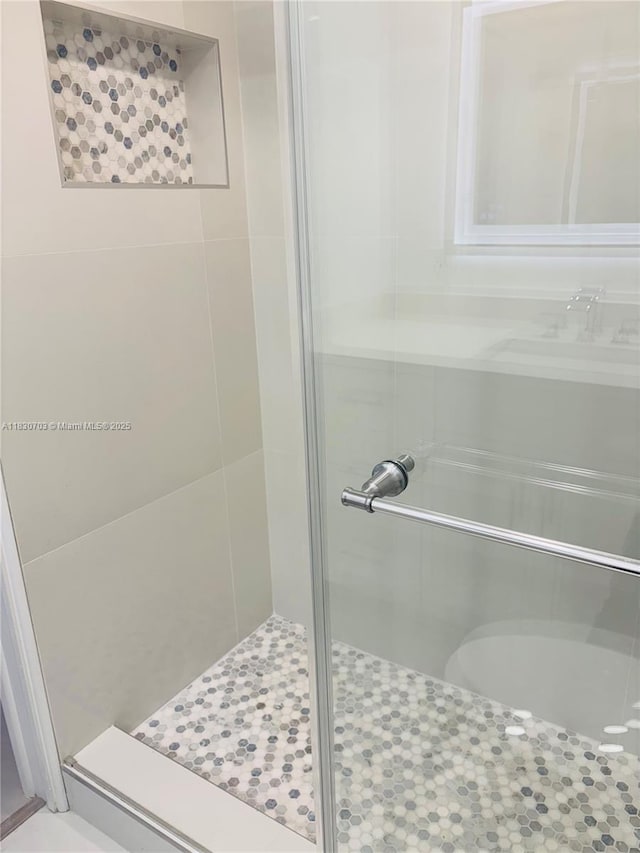 4025 Ellesmere B 4025, Deerfield Beach, FL 33442 - bathroom with a shower stall and tile patterned floors