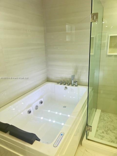 15271 NW 6th Ct, Pembroke Pines, FL 33028 - bathroom with a jetted tub, a stall shower, and tile patterned floors