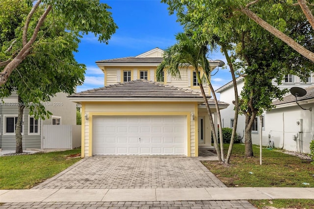 3156 NE 4th St, Homestead, FL 33033 - traditional home with decorative driveway and an attached garage
