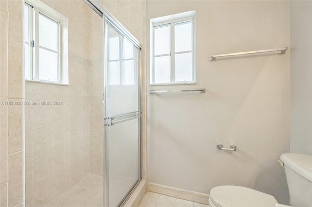 3156 NE 4th St, Homestead, FL 33033 - full bathroom featuring plenty of natural light, a shower stall, and tile patterned floors
