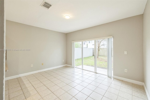 3156 NE 4th St, Homestead, FL 33033 - spare room with baseboards and light tile patterned flooring