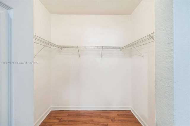 3156 NE 4th St, Homestead, FL 33033 - spacious closet featuring wood finished floors