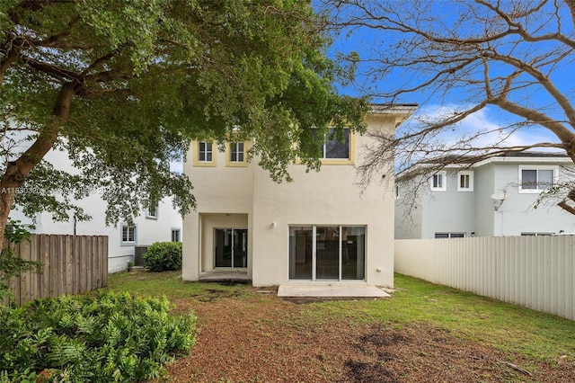 3156 NE 4th St, Homestead, FL 33033 - rear view of house with stucco siding