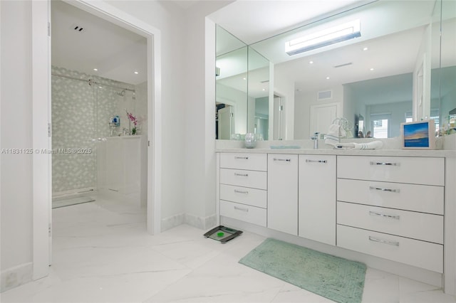 9511 Collins Ave Unit 1502, Surfside, FL 33154 - bathroom with a shower stall, marble finish flooring, and vanity