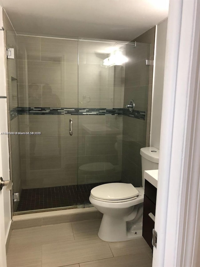 8670 NW 6th Ln Unit 4-208, Miami, FL 33126 - full bath featuring vanity, a shower stall, and tile patterned floors