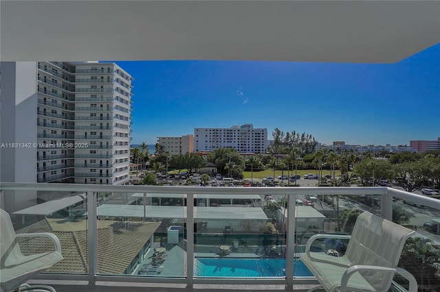 1620 N Ocean Blvd Unit 510, Pompano Beach, FL 33062 - balcony with a city view and view of pool area