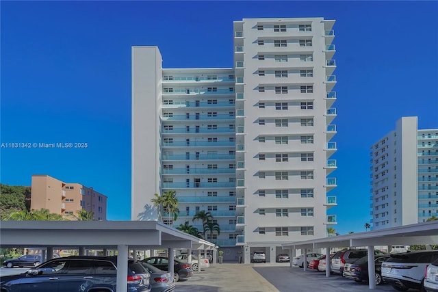 1620 N Ocean Blvd Unit 510, Pompano Beach, FL 33062 - view of building exterior featuring covered parking
