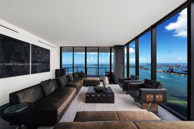 788 NE 23rd St Unit 5401, Miami, FL 33137 - living room featuring a water view and floor to ceiling windows