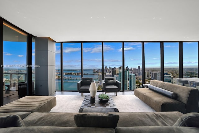 788 NE 23rd St Unit 5401, Miami, FL 33137 - living room featuring expansive windows, wood finished floors, a water view, and a view of city