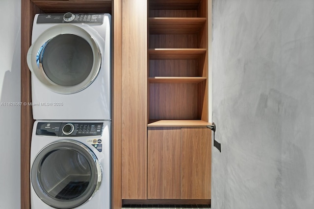788 NE 23rd St Unit 5401, Miami, FL 33137 - laundry room featuring stacked washing machine and dryer