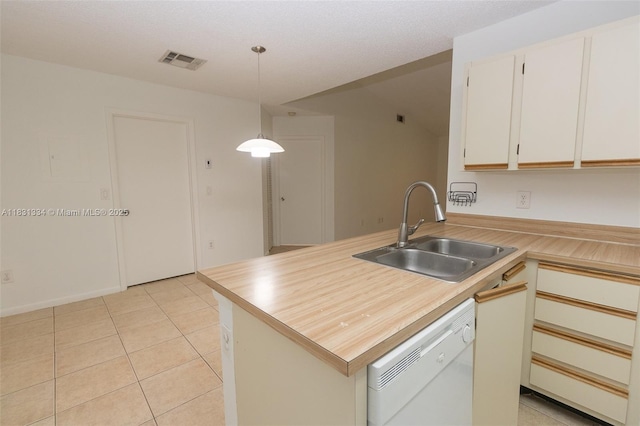 18328 NW 68th Ave Unit P, Hialeah, FL 33015 - kitchen featuring dishwasher, decorative light fixtures, a peninsula, light tile patterned flooring, and white cabinets