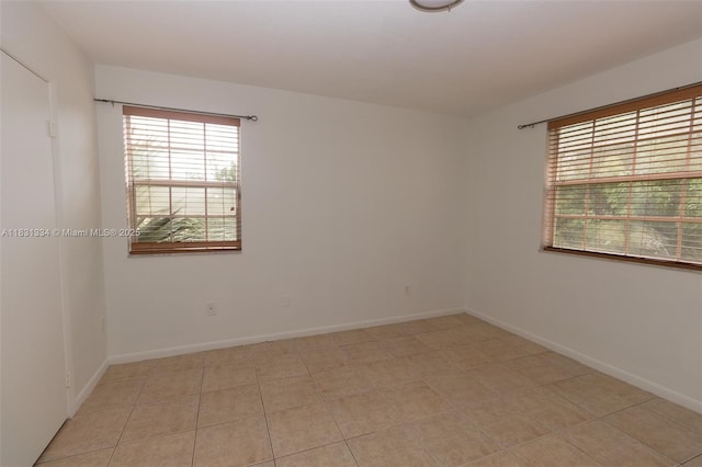 18328 NW 68th Ave Unit P, Hialeah, FL 33015 - unfurnished room with plenty of natural light