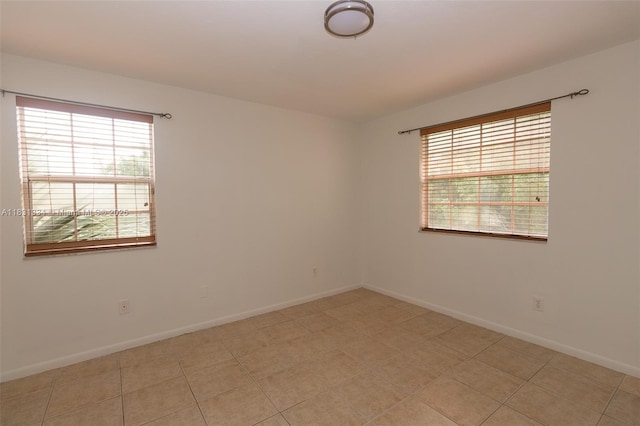 18328 NW 68th Ave Unit P, Hialeah, FL 33015 - empty room with baseboards