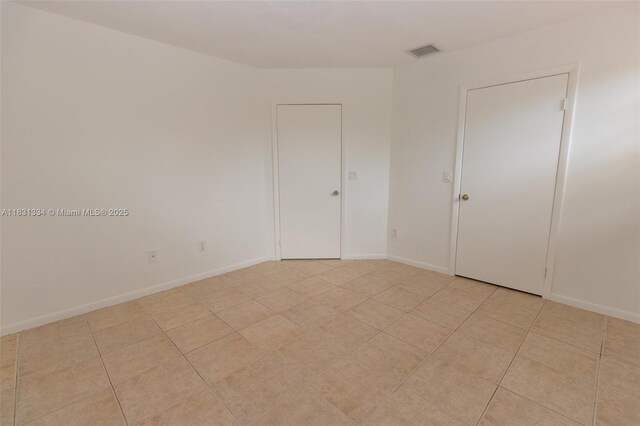18328 NW 68th Ave Unit P, Hialeah, FL 33015 - unfurnished room featuring baseboards