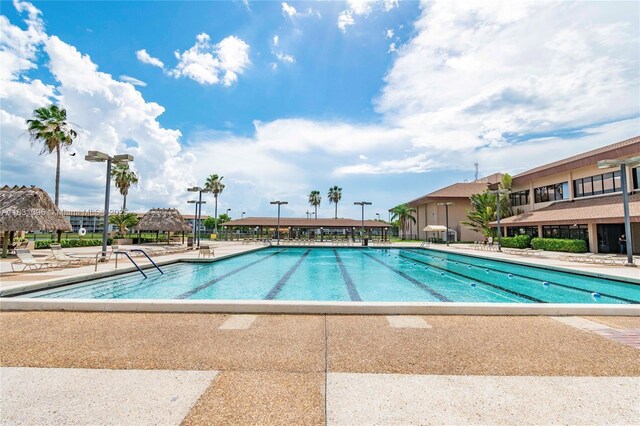300 SW 134th Way Unit 413E, Pembroke Pines, FL 33027 - community pool featuring a patio