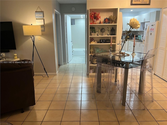 8251 NW 8th St Unit 214, Miami, FL 33126 - hallway featuring light tile patterned flooring