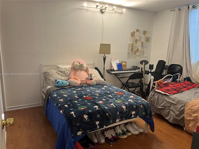 8251 NW 8th St Unit 214, Miami, FL 33126 - bedroom with wood finished floors