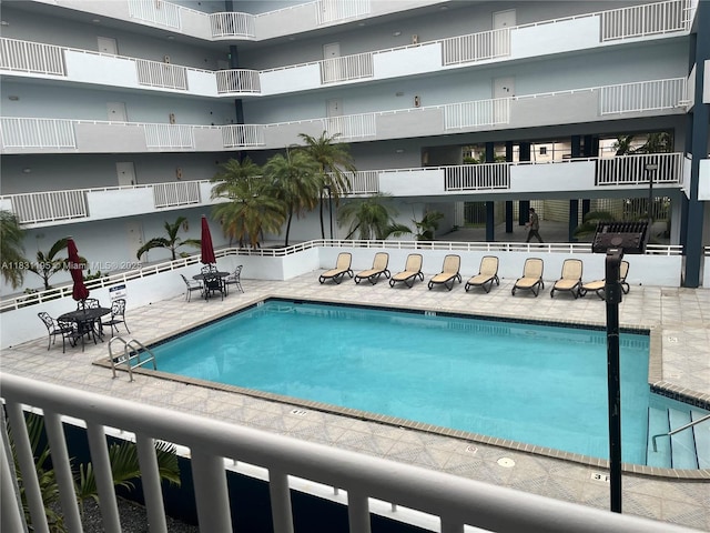 8251 NW 8th St Unit 214, Miami, FL 33126 - community pool with a patio area