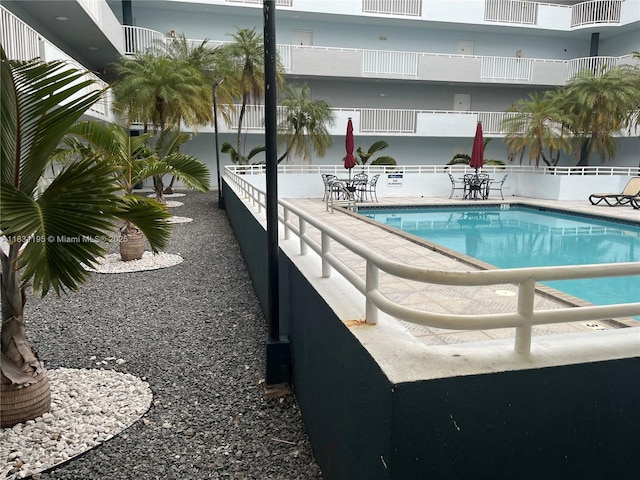 8251 NW 8th St Unit 214, Miami, FL 33126 - community pool featuring a patio area