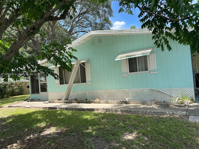 8955 SW 104th Ln Fl, Ocala, FL 34481 - view of side of property with a yard