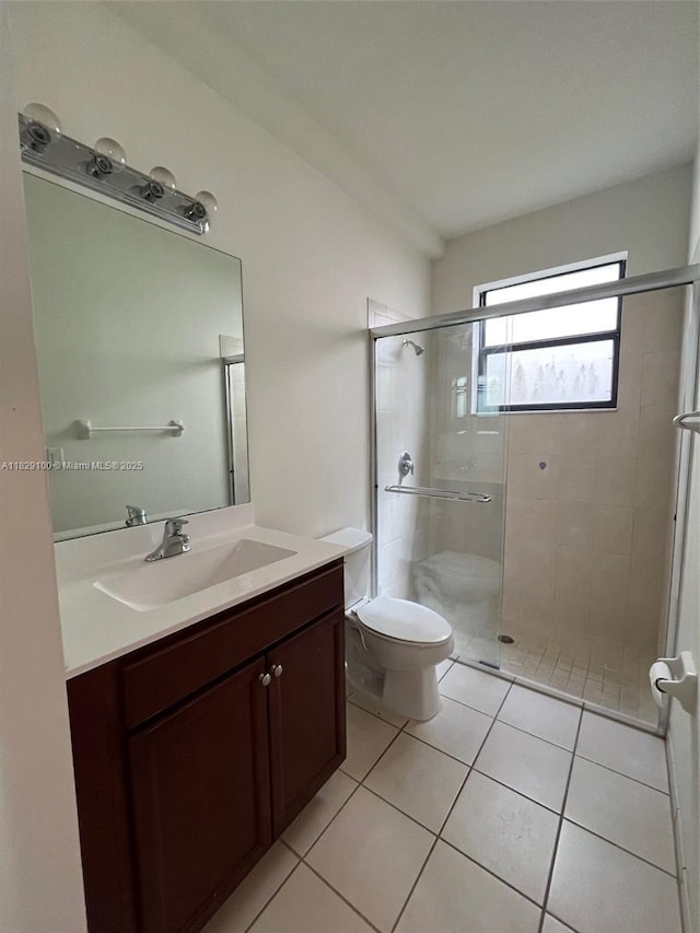 738 SE 37th Pl, Homestead, FL 33033 - full bathroom with a stall shower, vanity, and tile patterned flooring