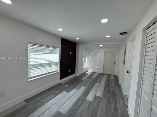 1794 NW 74th Ter, Miami, FL 33147 - spare room with recessed lighting and dark wood-type flooring