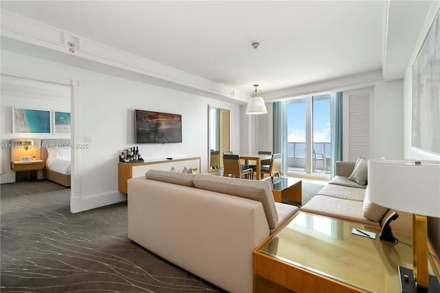 1 N Fort Lauderdale Beach Blvd Unit 1606, Fort Lauderdale, FL 33304 - living area featuring baseboards and dark marble finish flooring