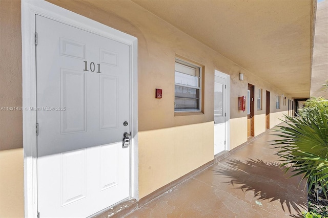 219 NE 14th Ave Unit 101, Hallandale Beach, FL 33009 - entrance to property with stucco siding