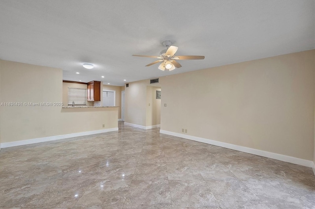 219 NE 14th Ave Unit 101, Hallandale Beach, FL 33009 - unfurnished living room featuring ceiling fan and recessed lighting