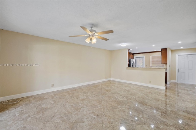 219 NE 14th Ave Unit 101, Hallandale Beach, FL 33009 - unfurnished living room featuring a ceiling fan and recessed lighting