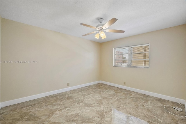 219 NE 14th Ave Unit 101, Hallandale Beach, FL 33009 - empty room with a ceiling fan and a textured ceiling