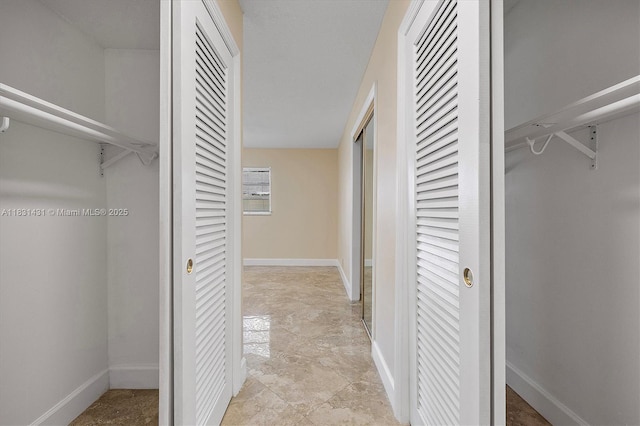 219 NE 14th Ave Unit 101, Hallandale Beach, FL 33009 - hallway featuring baseboards