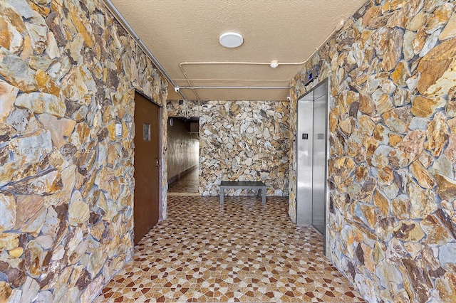 219 NE 14th Ave Unit 101, Hallandale Beach, FL 33009 - corridor with elevator
