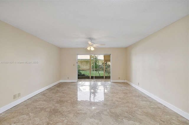 219 NE 14th Ave Unit 101, Hallandale Beach, FL 33009 - unfurnished room featuring a ceiling fan and marble finish floors