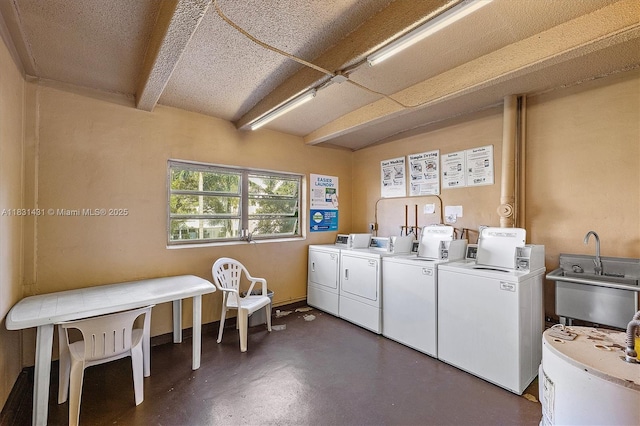 219 NE 14th Ave Unit 101, Hallandale Beach, FL 33009 - community laundry room with washing machine and dryer