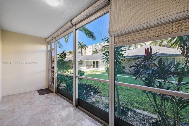 219 NE 14th Ave Unit 101, Hallandale Beach, FL 33009 - view of unfurnished sunroom