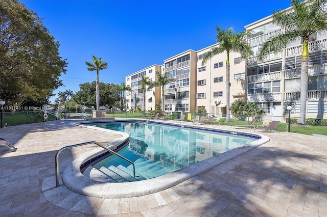 219 NE 14th Ave Unit 101, Hallandale Beach, FL 33009 - community pool with a patio