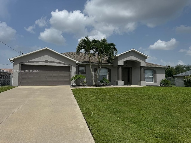 1305 SW 22, Cape Coral, FL 33991 - single story home featuring stucco siding, an attached garage, and driveway